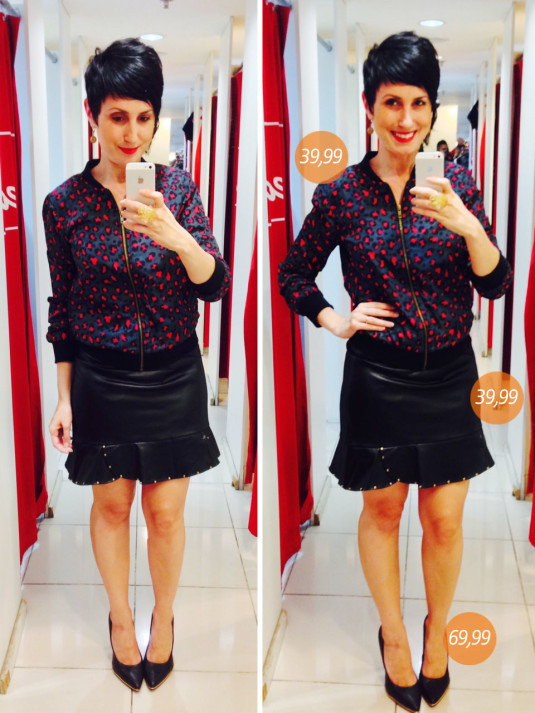 jaqueta azul arroxeado com estampa de oncinha em vermelho e saia curta preta com tachinhas na barra